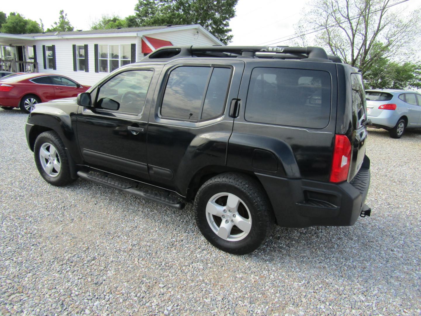 2005 Black /BROWN/TAN Nissan Xterra (5N1AN08U85C) with an 6 Cyl engine, Automatic transmission, located at 15016 S Hwy 231, Midland City, AL, 36350, (334) 983-3001, 31.306210, -85.495277 - Photo#5